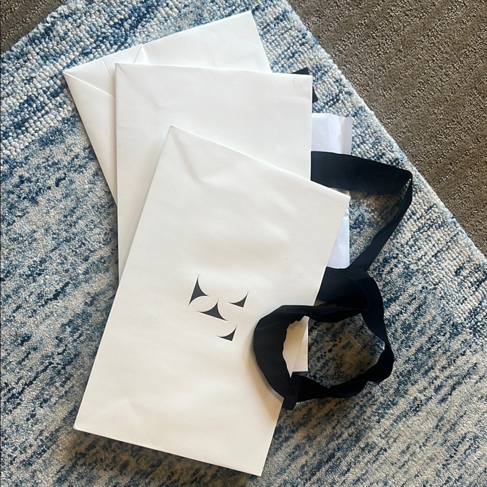 White Fleur du Mal Shopping Bags with Black ribbon Handles